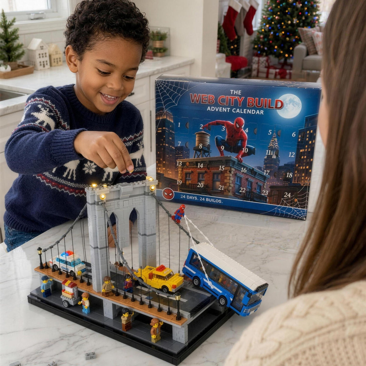 A boy building The Web City Build with his mom